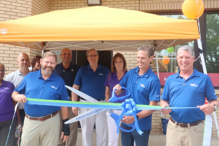 MJE-L-RIBBON-CUTTING-AGENCY-0814-02 Jeff Alison and colleagues celebrate opening of first HealthMarkets office in Lorain County.